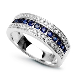 Staviori pierścionek. 36 diamentów, szlif brylantowy, masa 0,30 ct., barwa h, czystość i1. 12 szafirów, szlif brylantowy, masa 0,45 ct.. białe złoto 0,585. szerokość obrączki ok. 6 mm.   