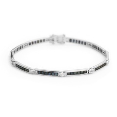 Staviori bransoleta 18cm. 37 diamentów, szlif brylantowy, masa 0,32 ct., barwa g-h, czystość si1. 60 szafirów, masa 3,43 ct.. białe złoto 0,750. szerokość 3 mm.