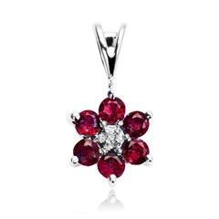 Staviori wisiorek białe złoto 0,585. 1 diament, szlif brylantowy, masa 0,005 ct., barwa h, czystość i1. 6 rubinów, masa 0,40 ct.. 