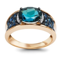 Staviori pierścionek 1 topaz błękitny, masa 2,24 ct.. 14 szafirów, masa 0,53 ct.. 10 diamentów, masa 0,02 ct., barwa h, czystość i1-i2. żółte złoto 0,585.   
