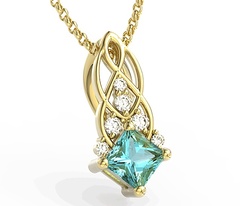 Wisiorek z żółtego złota z topazem swarovski ice blue i brylantami bpw-86z