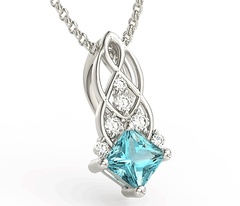 Wisiorek z białego złota z topazem swarovski ice blue i brylantami bpw-86b