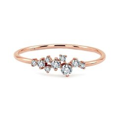 Staviori pierścionek z białymi diamentami. 9 diamentów, szlif brylantowy, masa 0,20 ct., barwa h, czystość si1-si2. różowe złoto 0,585. korona 21x4 mm. szerokość obrączki ok. 1,2 mm.   