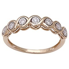 Staviori pierścionek. 7 diamentów, szlif brylantowy, masa 0,11 ct., barwa h, czystość i1. żółte, białe złoto 0,585. szerokość 4 mm.   